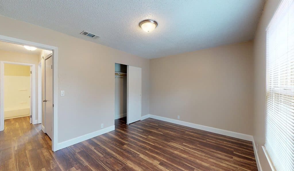 Comfortable bedroom with new flooring