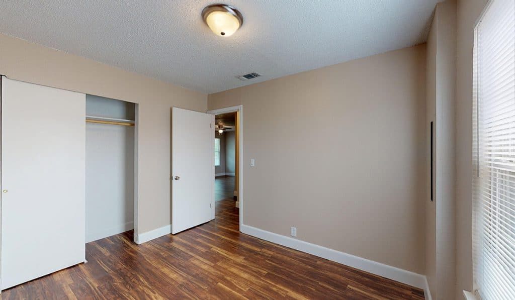 Second bedroom with warm finishes